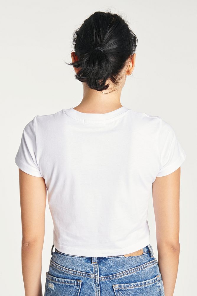 Woman in a white crop top rear view 