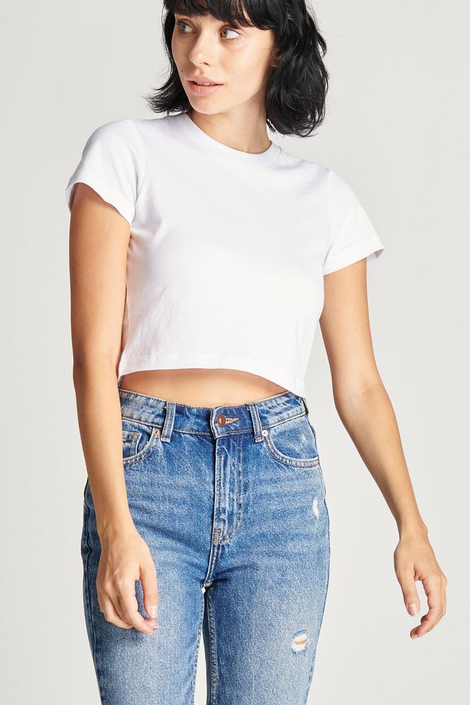 Women's sexy white crop top with high waisted jeans