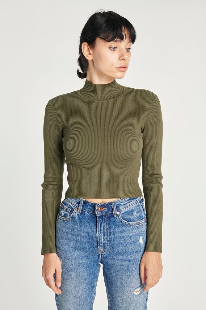 Women in a green turtleneck top with blue jeans mockup