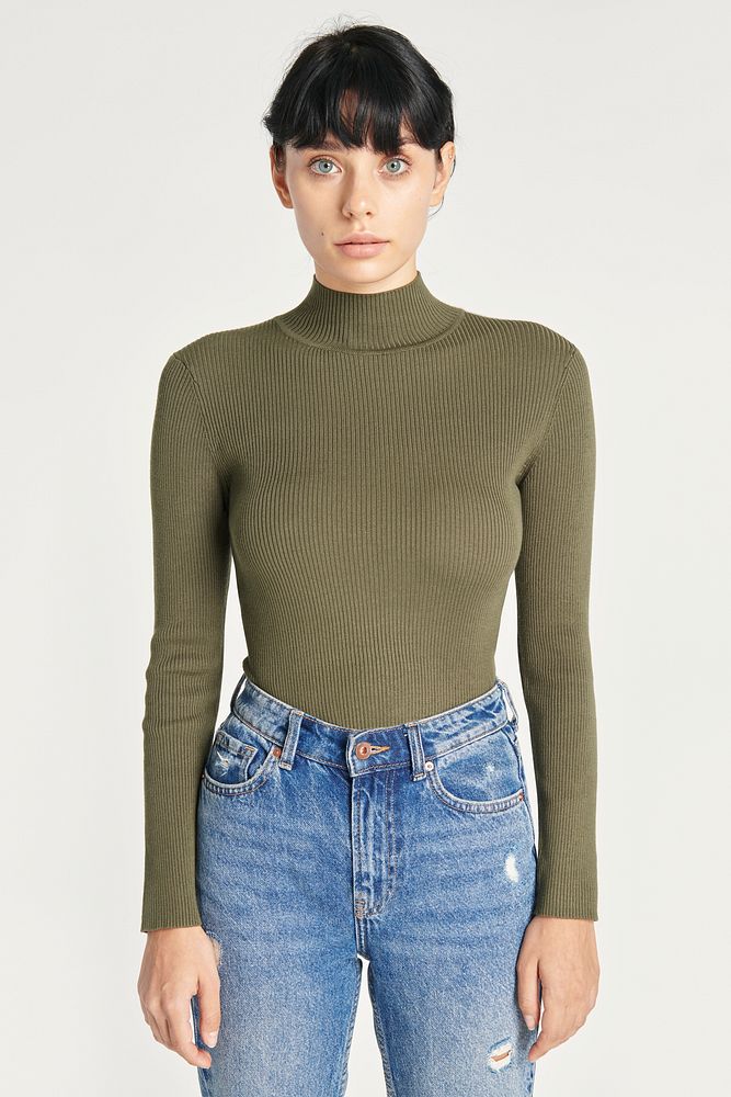 Woman wearing an army green high neck top mockup with high waisted blue jeans