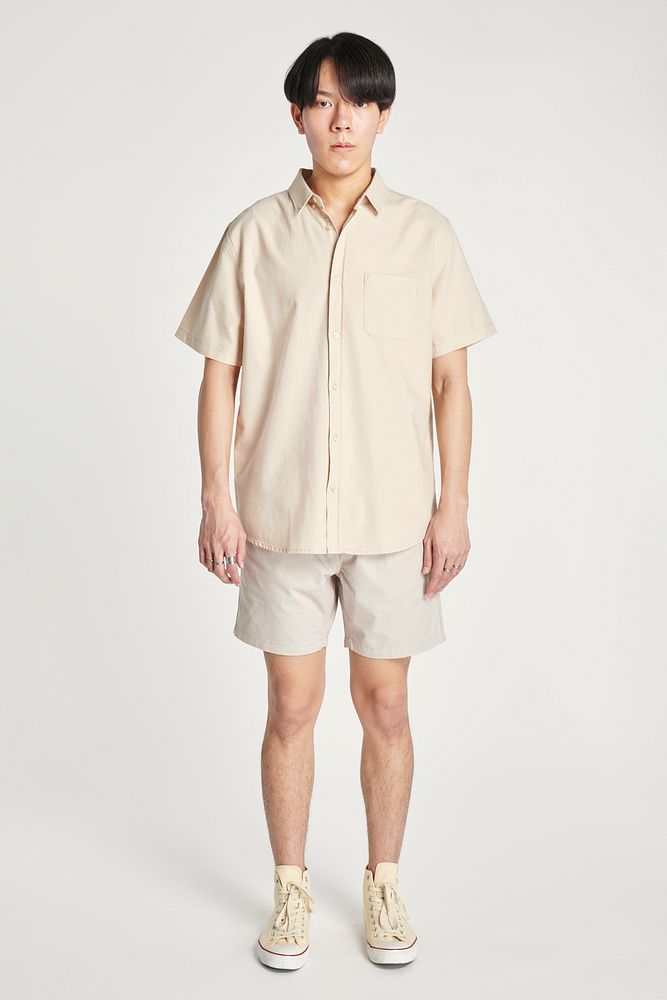 Asian man in a beige shirt 
