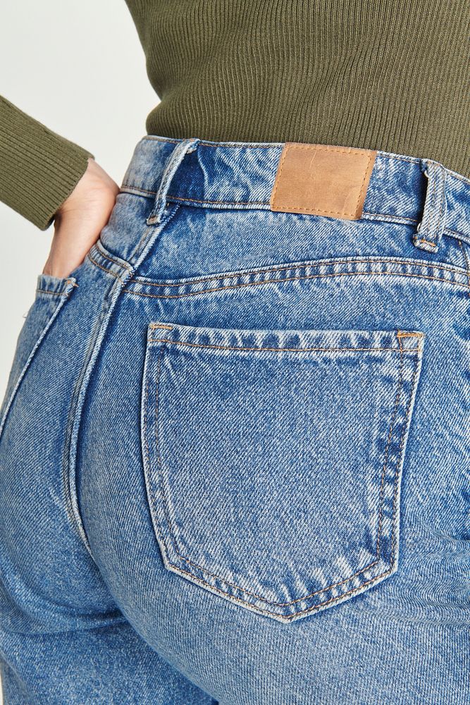 Woman in a blue jeans with a tag mockup