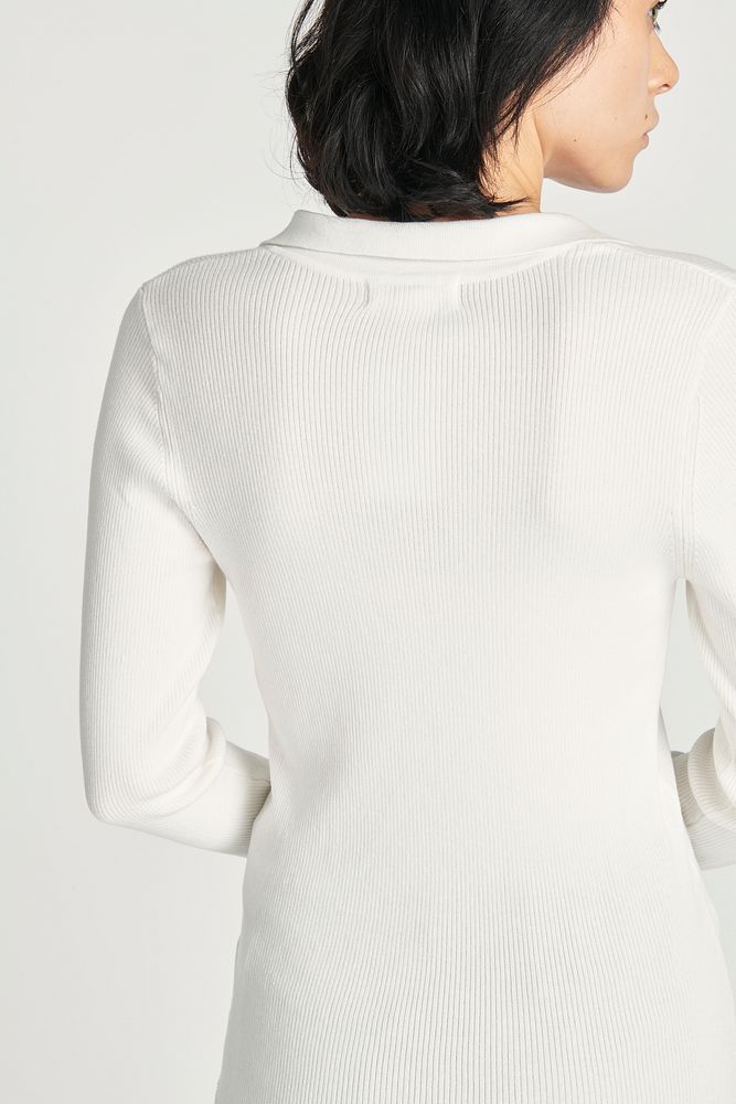 Woman in long sleeved white t-shirt
