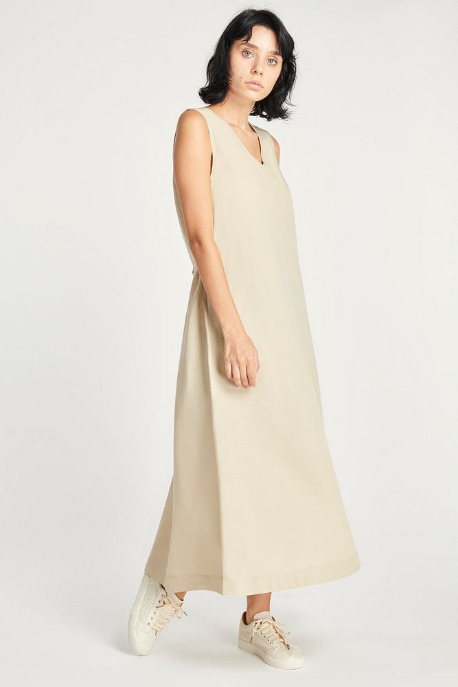 Woman in a minimal beige dress 