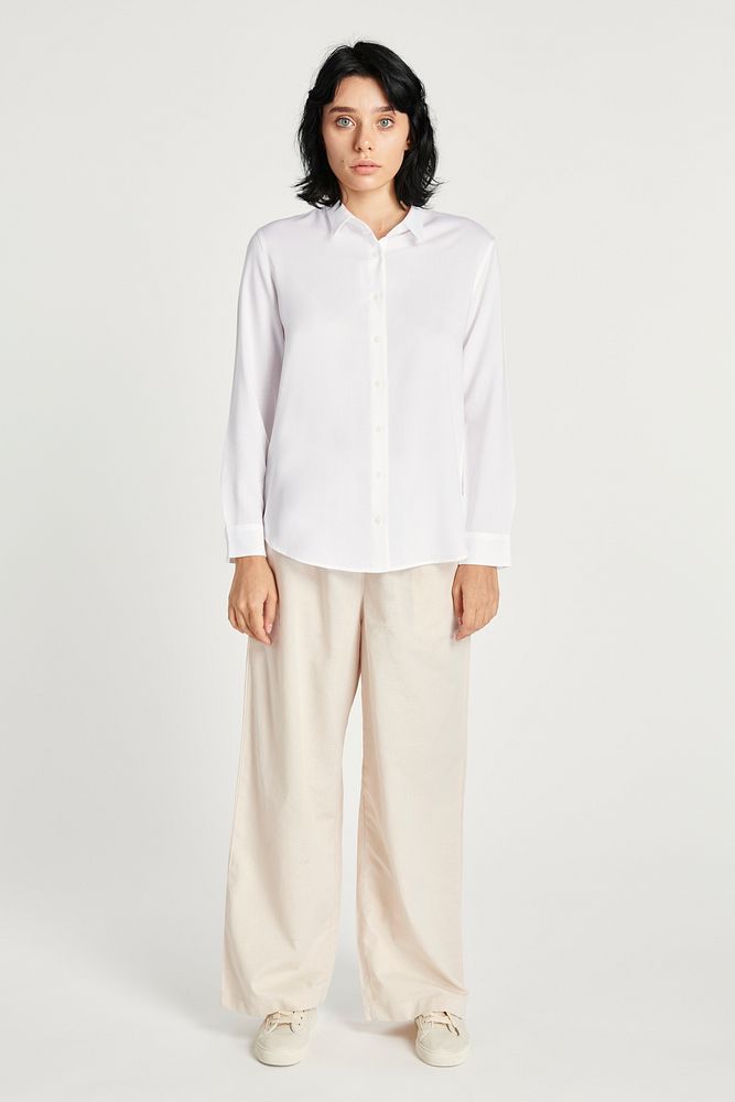 Woman wearing minimal pants with a white shirt 