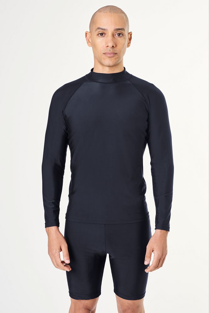 Man in a black long sleeved swimming top 