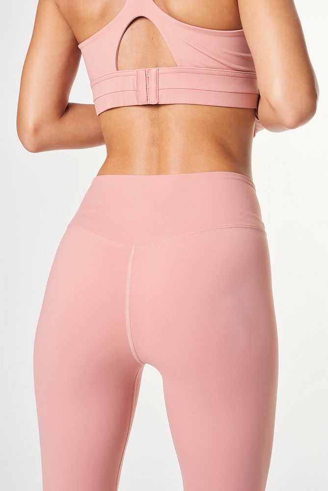Woman in a baby pink workout leggings