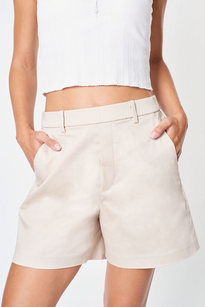 Woman wearing a beige tailored shorts