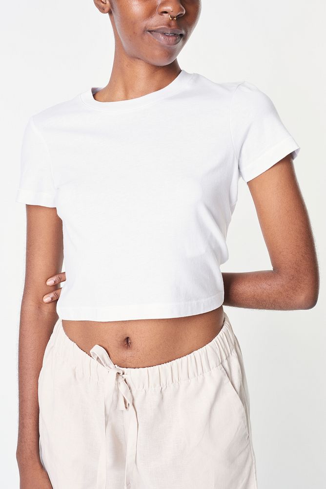 Women in a white crop top with sweatpants casual outfit 