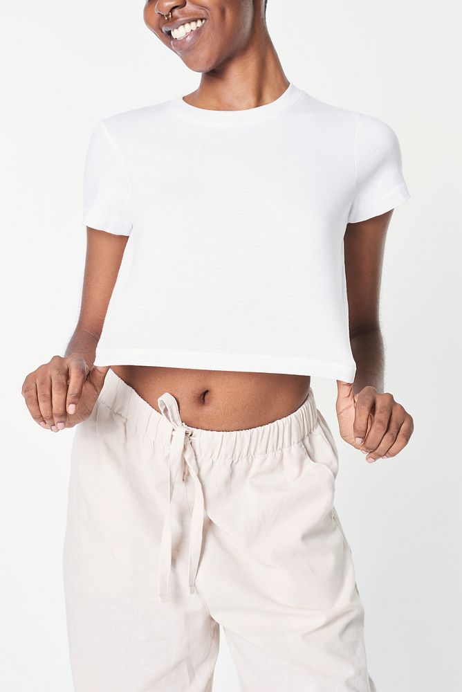 Women's white crop top with sweatpants minimal outfit 