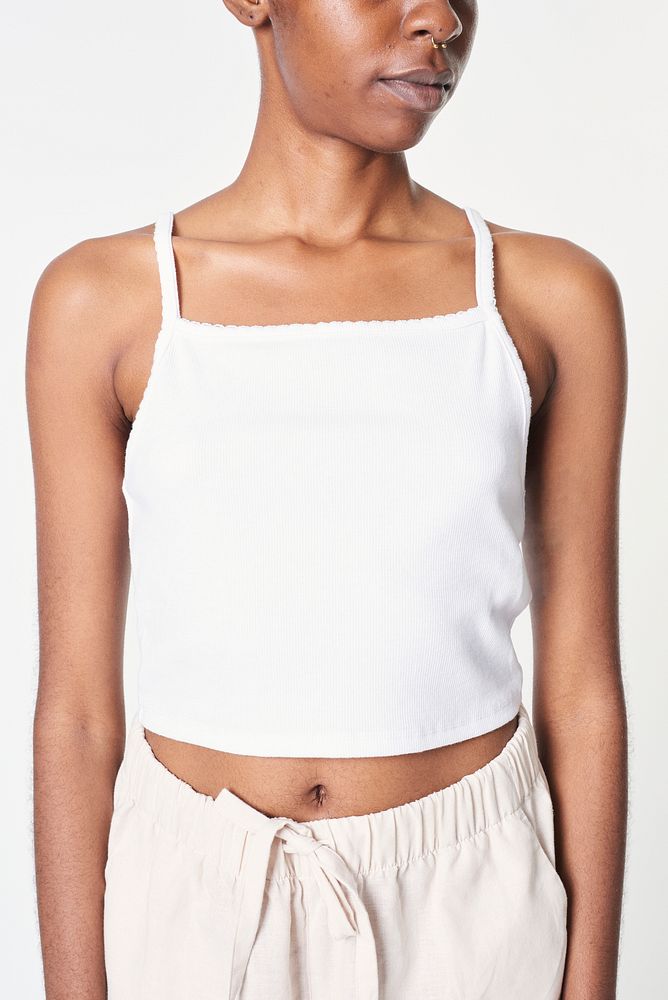 Black woman in cropped tank top summer outfit