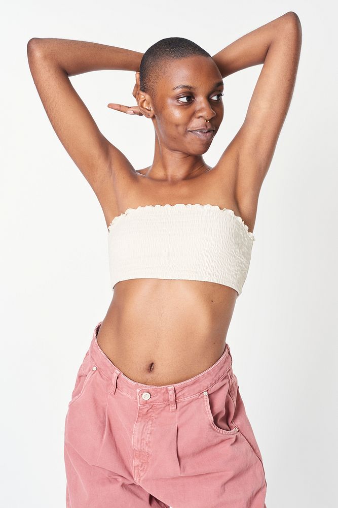 Black woman in pink jeans and a white bandeau top mockup