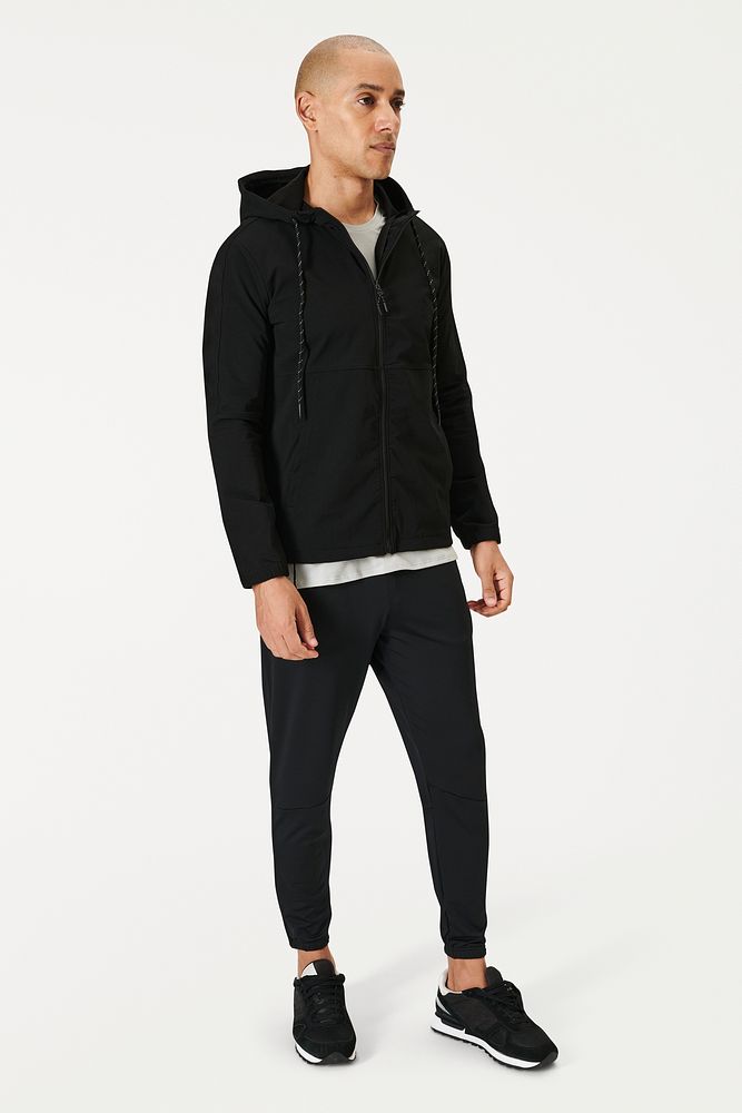 Man wearing a black hoodie over a t-shirt mockup