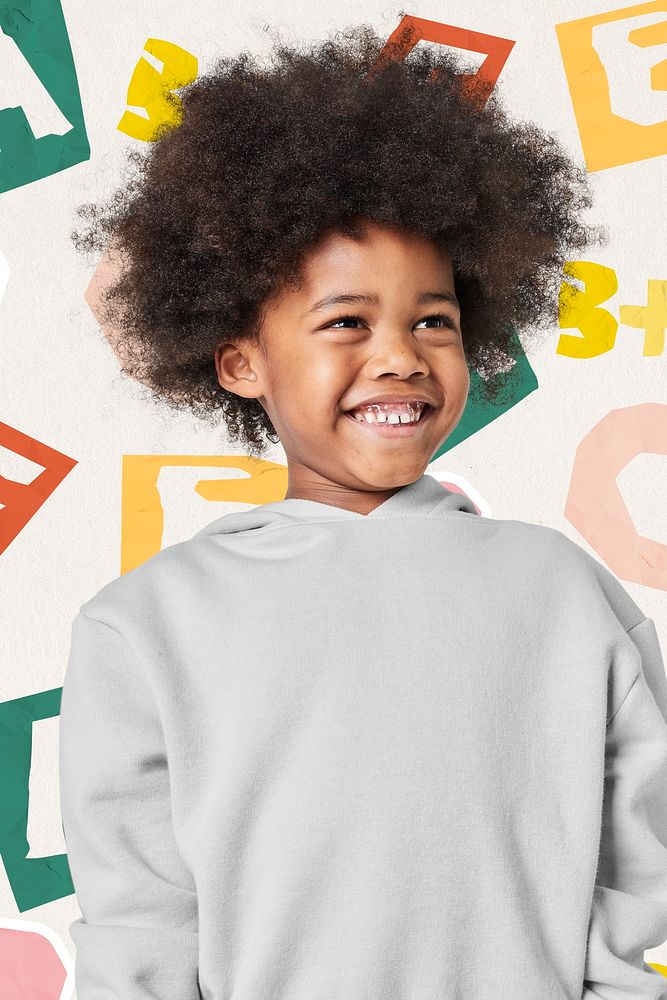 Black boy in gray sweatshirt studio shot