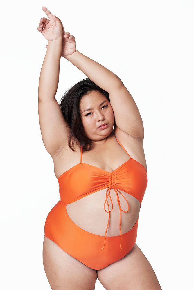 Women's orange swimsuit mockup fashion shoot in studio