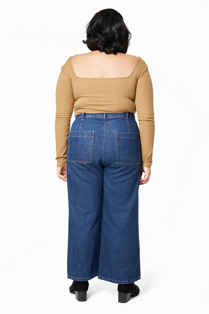 Women's top and jeans size inclusive fashion studio shot