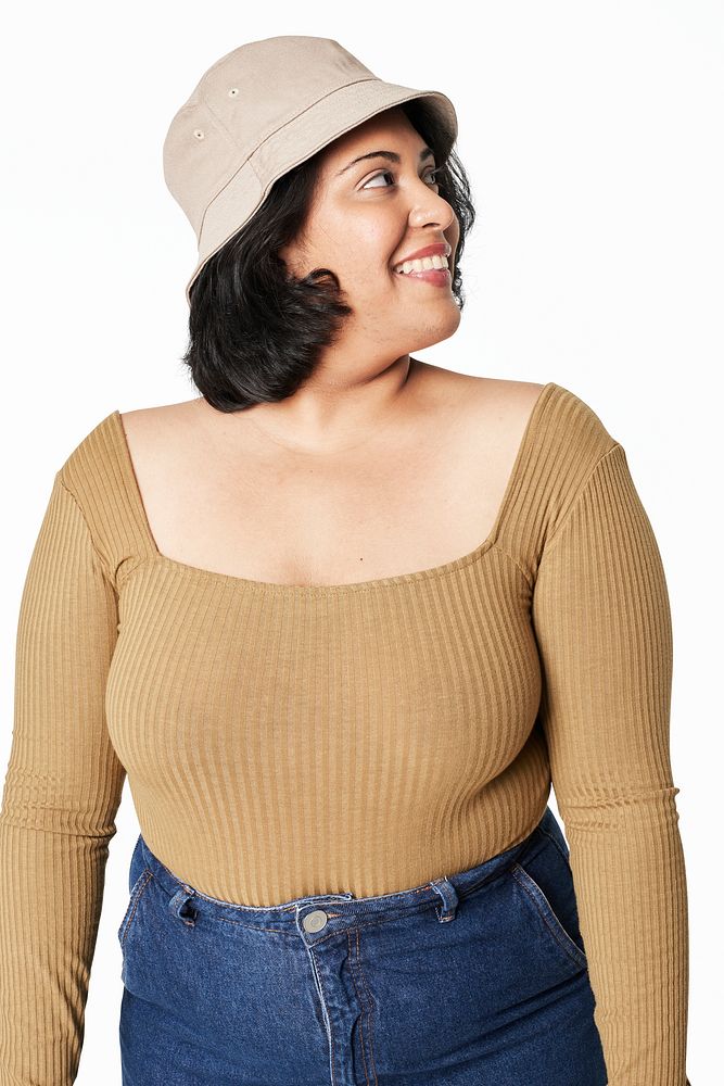 Women's brown top and jeans with hat plus size fashion studio shot