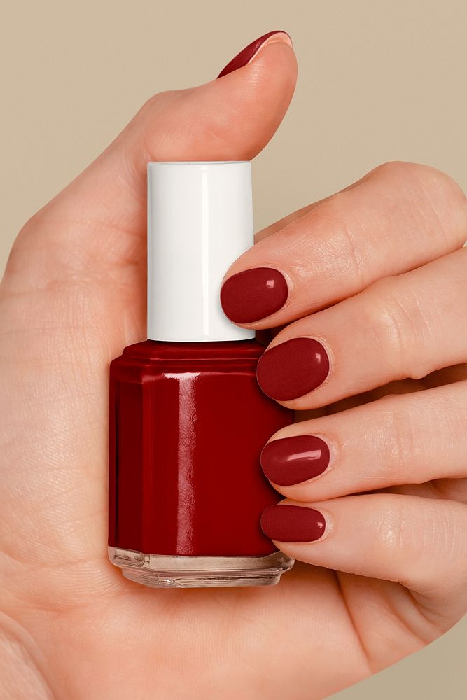 Red nail polish bottle for manicure
