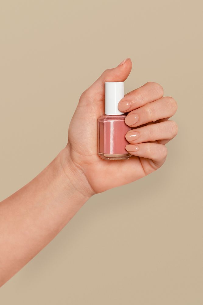 Pink nail polish bottle for manicure
