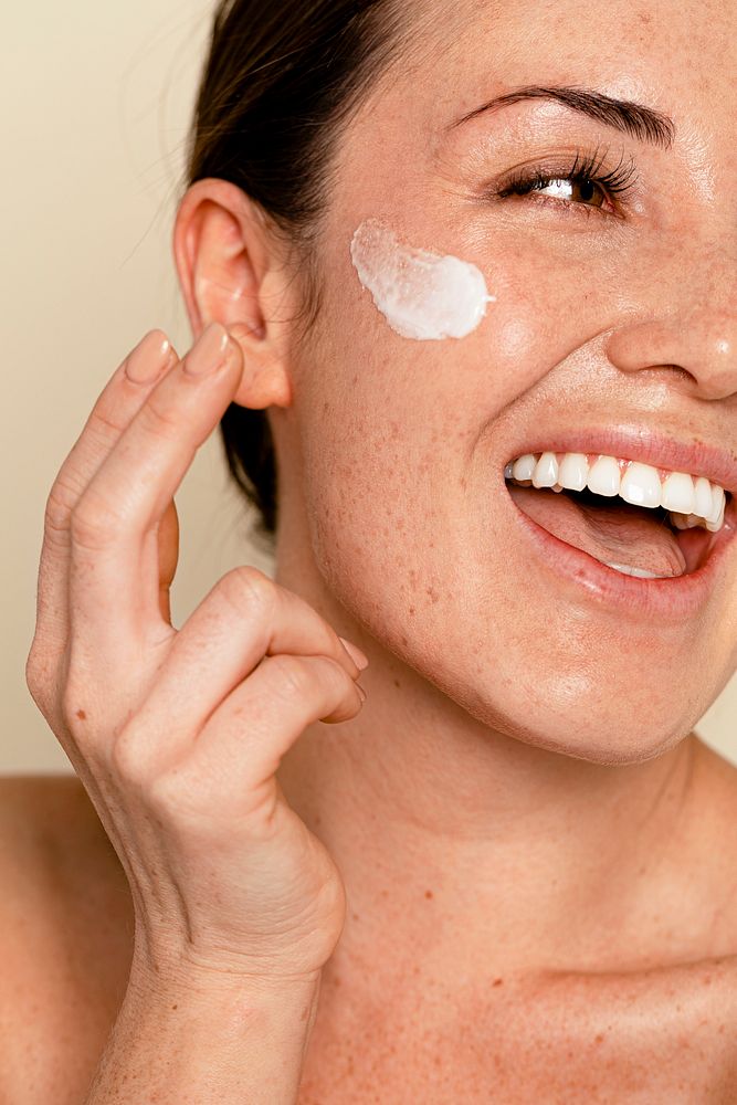 Moisturizing face cream on skin