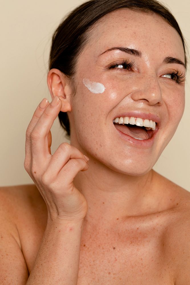 Moisturizing face cream on skin