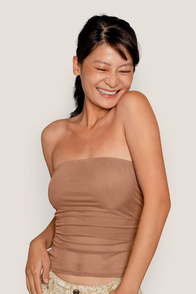 Smiling Asian woman half body psd