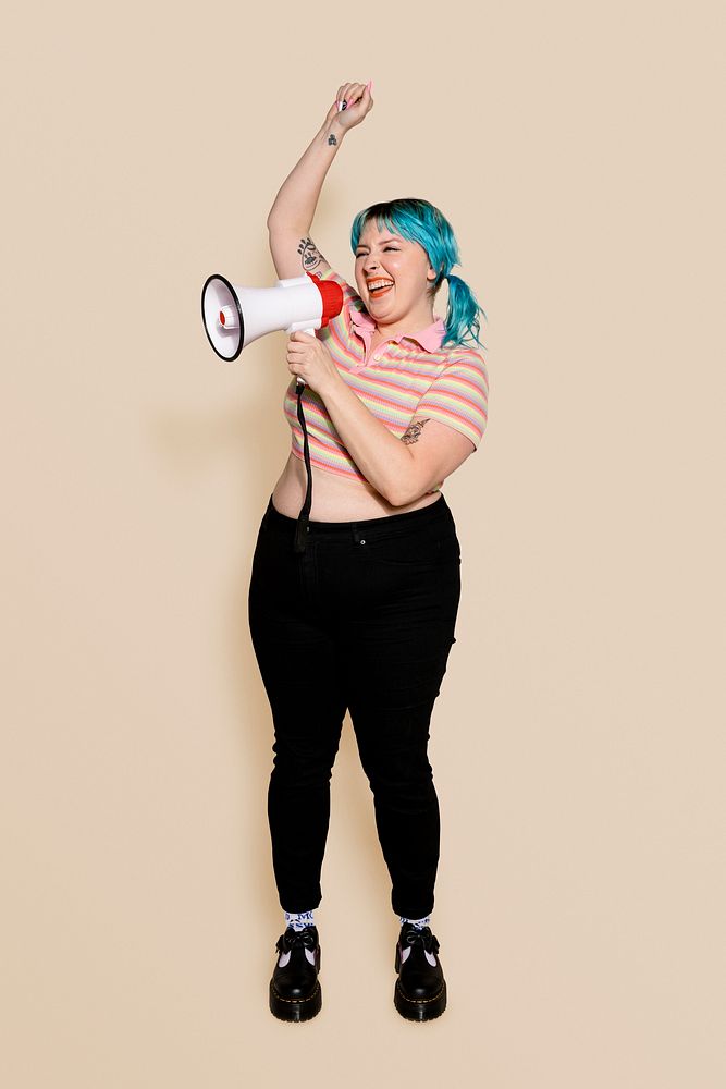 Feminist protesting with megaphone, shouting out message