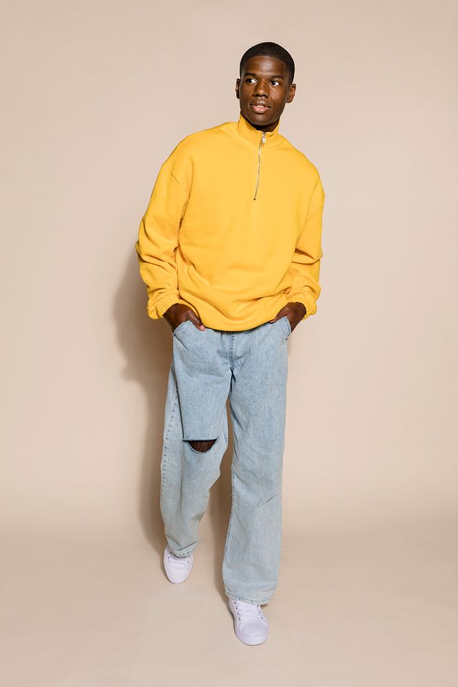 Handsome young man yellow sweater | Premium Photo - rawpixel