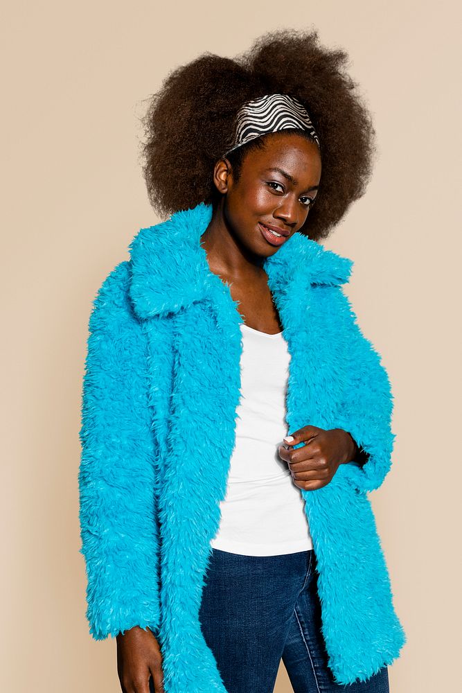 Woman wearing blue teddy coat