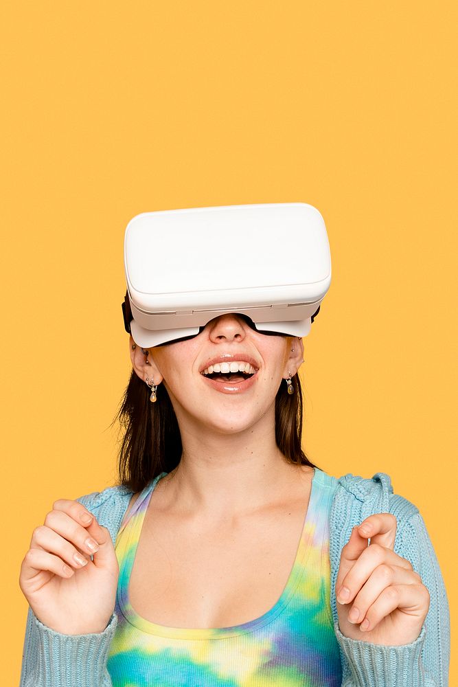 Beautiful woman having fun with VR headset digital device