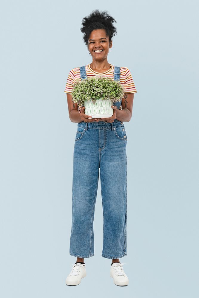 Plant lady mockup psd holding potted shrubs