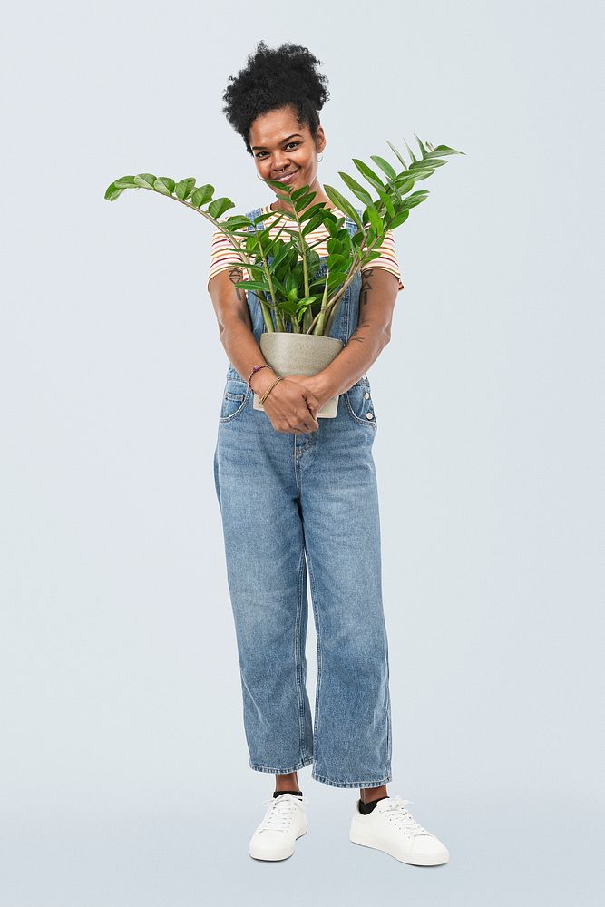 Happy plant parent mockup psd holding potted zanzibar gem