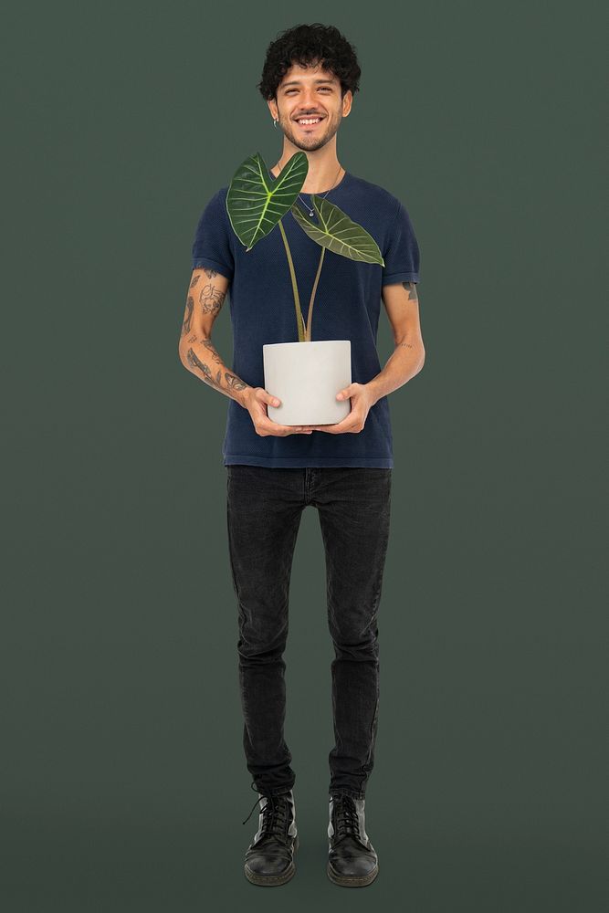 Happy plant parent mockup psd  holding potted alocasia longiloba