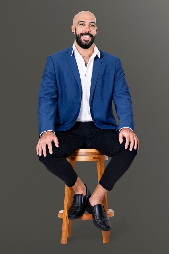 Cheerful businessman sitting mockup psd on a wooden stool jobs and career campaign