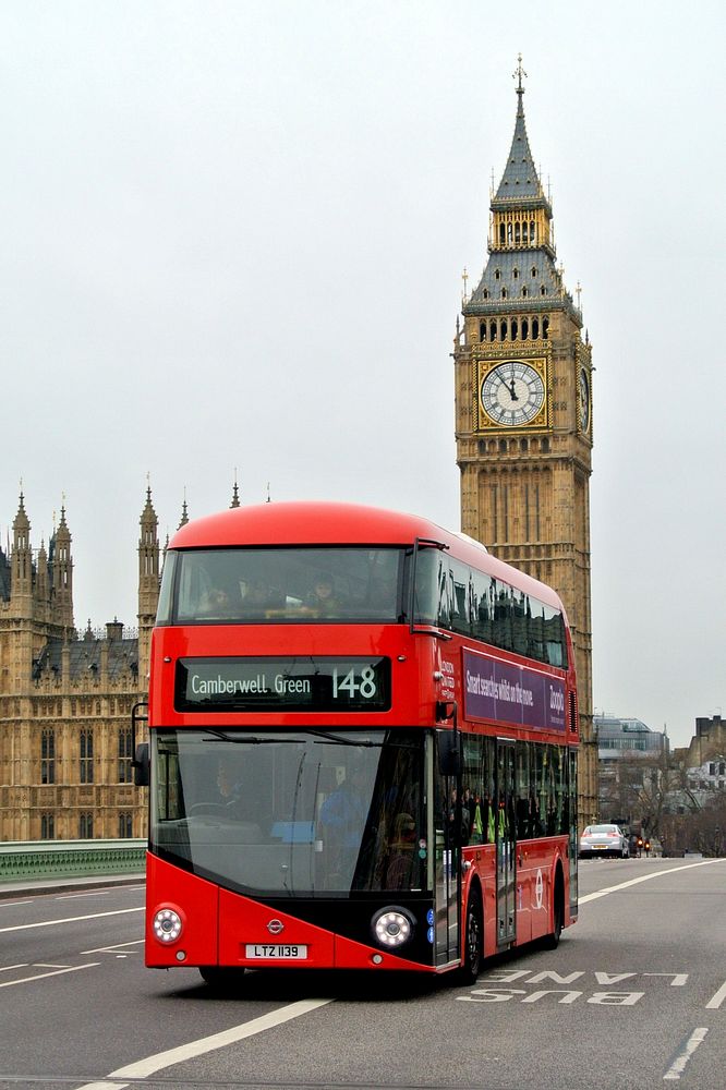 London bus outside Big Ben in London. Original public domain image from Wikimedia Commons