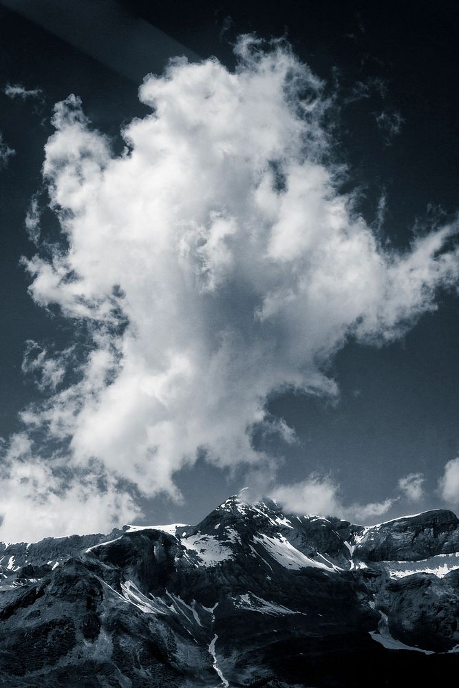 Clouded mountain in winter. Original public domain image from Wikimedia Commons