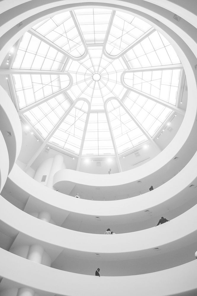 A white dome in the ceiling of a modern building. Original public domain image from Wikimedia Commons