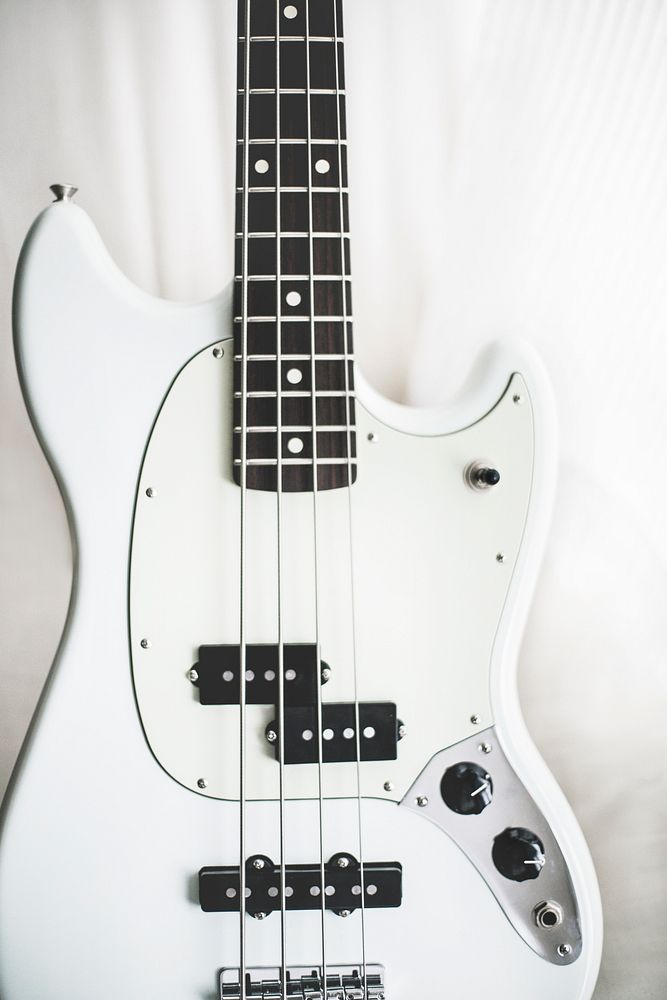 Electric guitar, close up shot in black and white. Original public domain image from Wikimedia Commons