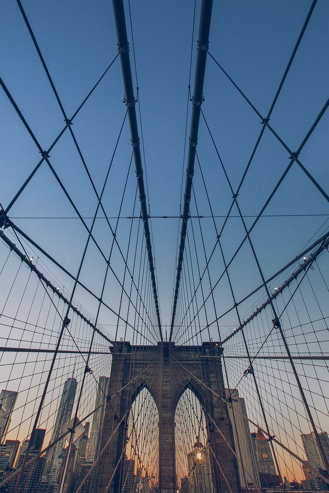 Brooklyn Bridge in New York City. Original public domain image from Wikimedia Commons