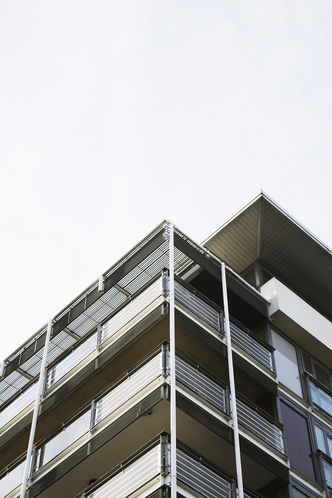 The edge of a modern residential building with large terraces. Original public domain image from Wikimedia Commons
