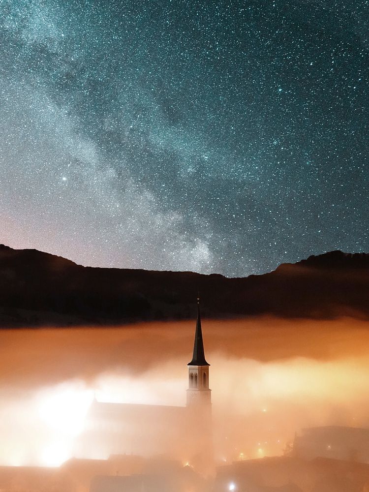 Starry sky over a church in Unterägeri on a foggy night. Original public domain image from Wikimedia Commons