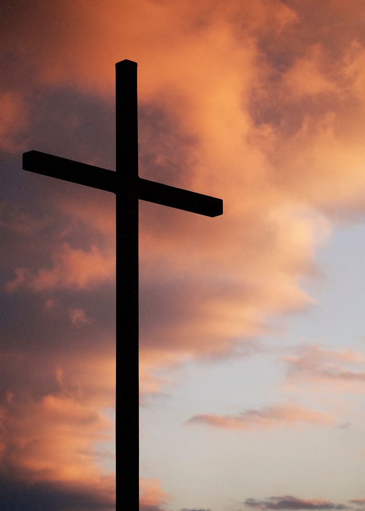 A cross against the colored sunset sky. Original public domain image from Wikimedia Commons