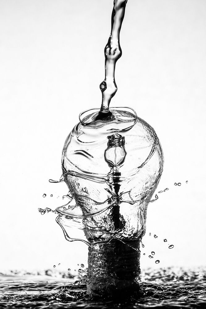 Water splashing against a lightbulb. Original public domain image from Wikimedia Commons