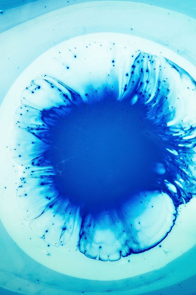 Blue splash texture in microscope. Original public domain image from Wikimedia Commons