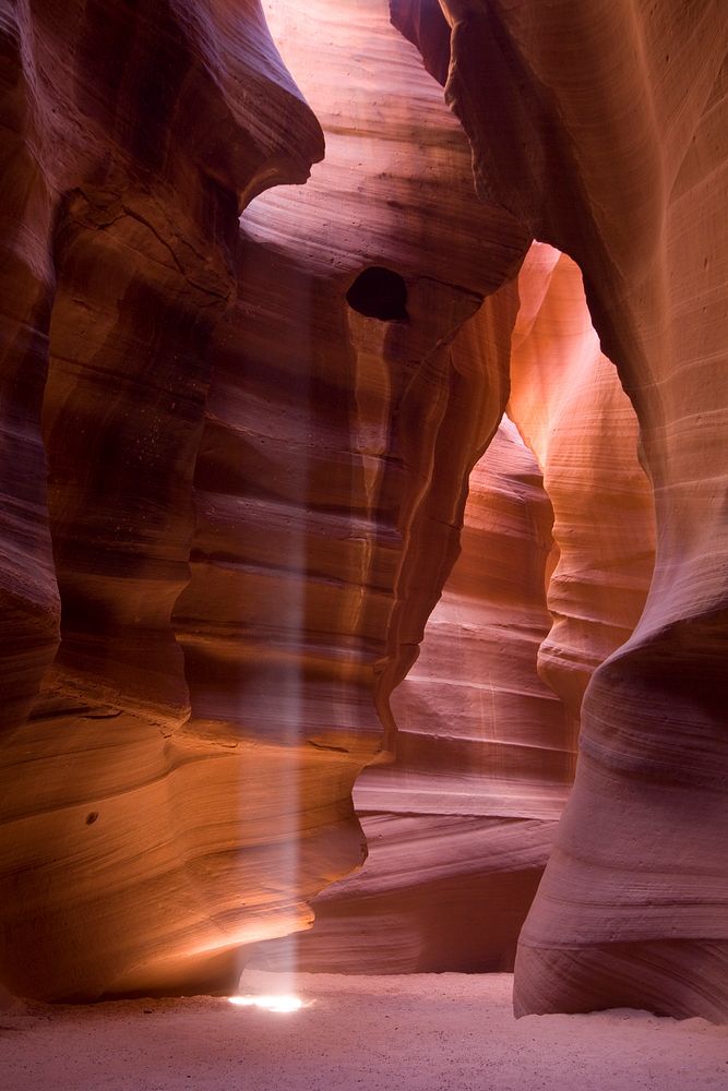 Inside a sandstone cave in the desert of Antelope Canyon. Original public domain image from Wikimedia Commons