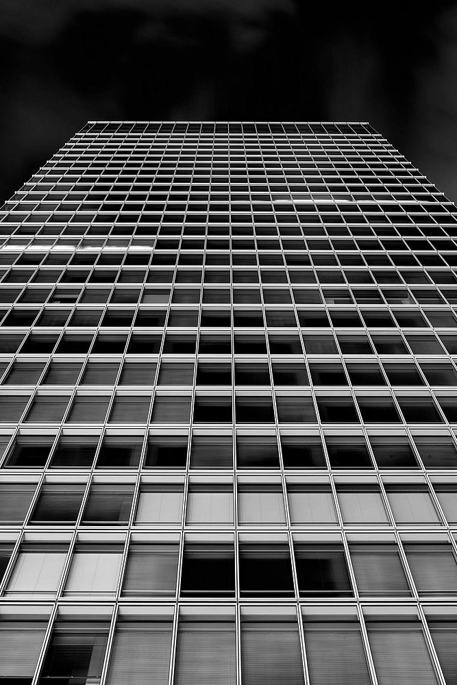 A desaturated shot of a tall office building in Akihabara. Original public domain image from Wikimedia Commons