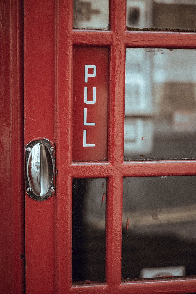 Pull sign on red door. Original public domain image from Wikimedia Commons