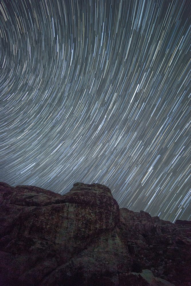 Time-lapse photo of starry night. Original public domain image from Wikimedia Commons