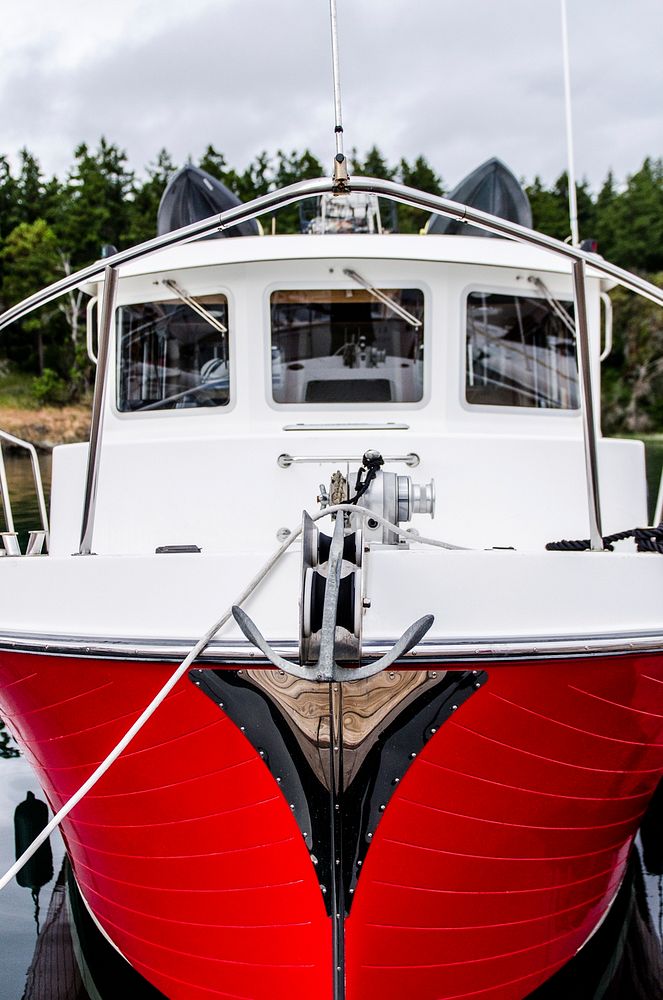 Red and white motorboat. Original public domain image from Wikimedia Commons