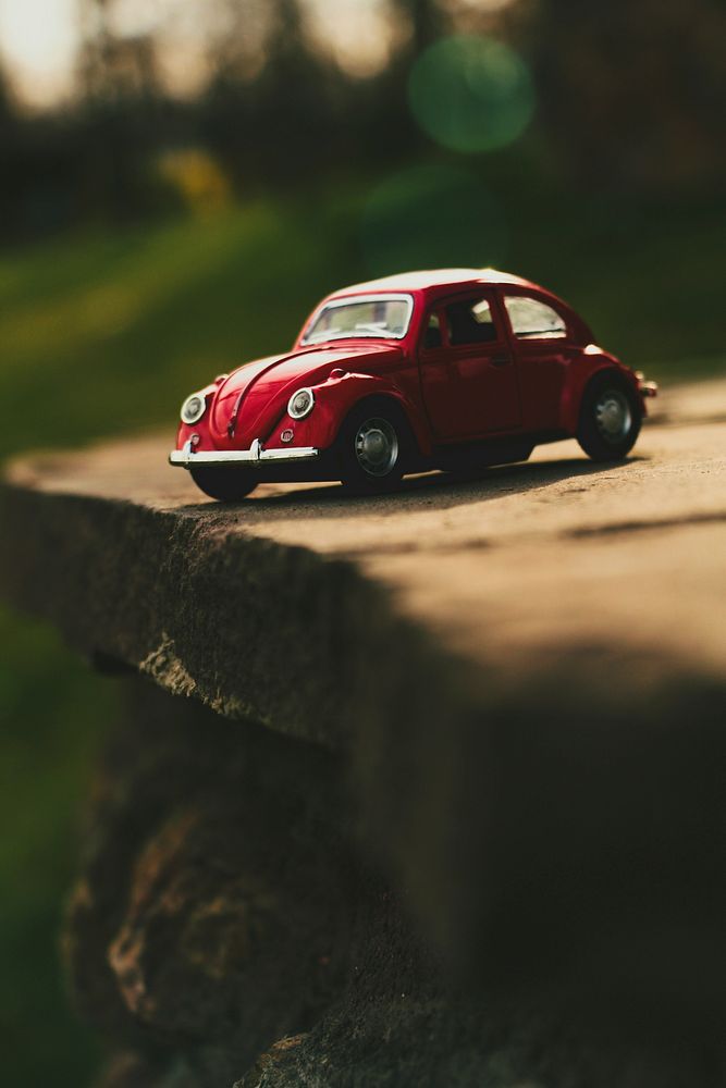 Red Volkswagen small model. Original public domain image from Wikimedia Commons